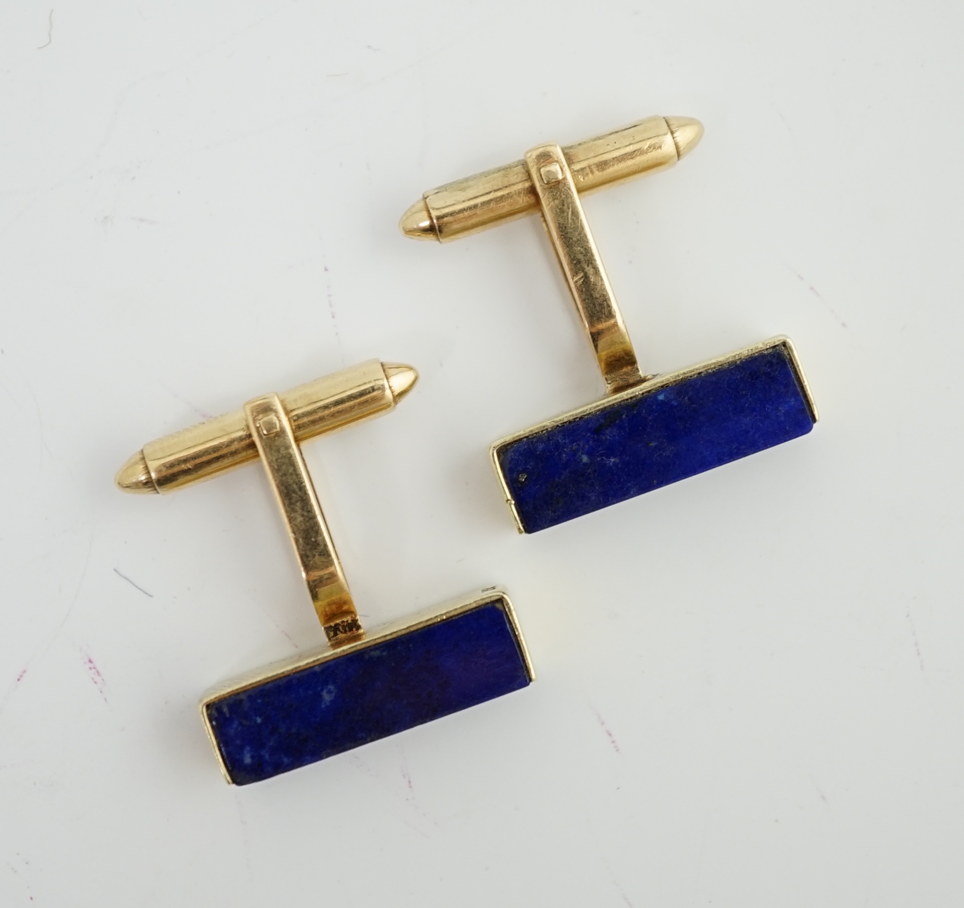 A pair of mid to late 20th century 14k gold and lapis lazuli set cufflinks